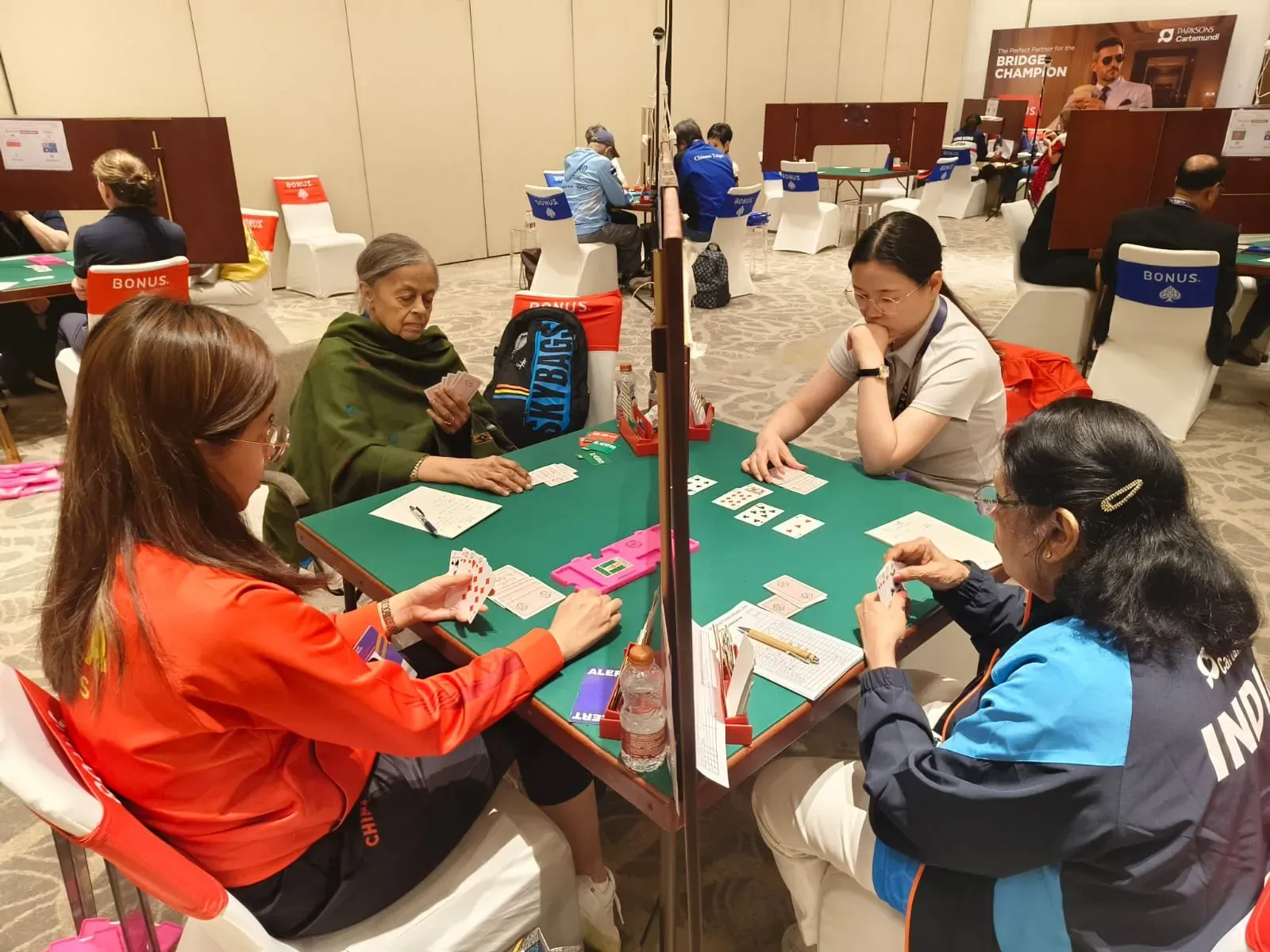 Three Indian sides have qualified for the semifinals of the 5th Bonus Asia Cup Bridge Championships in Goa. India B Seniors advance as the top seed, while India A Men and India A Women round out the Indian contingent in the knockout stage.